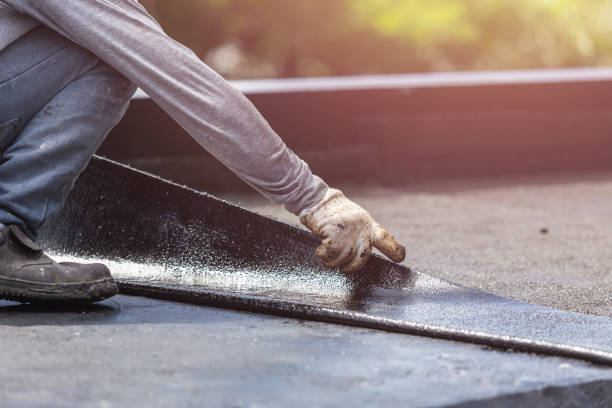 Professional Waterproofing technician working in Hall, NY